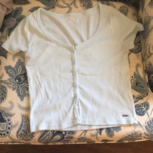 Light blue button up cropped tee shirt